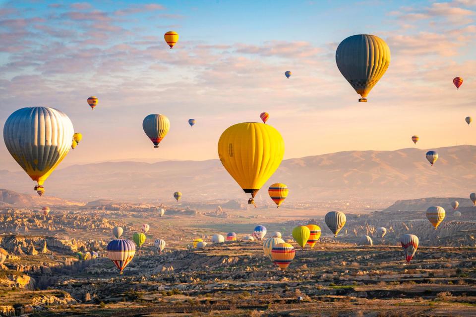 hot air balloons at sunrise cappadocia, turkey