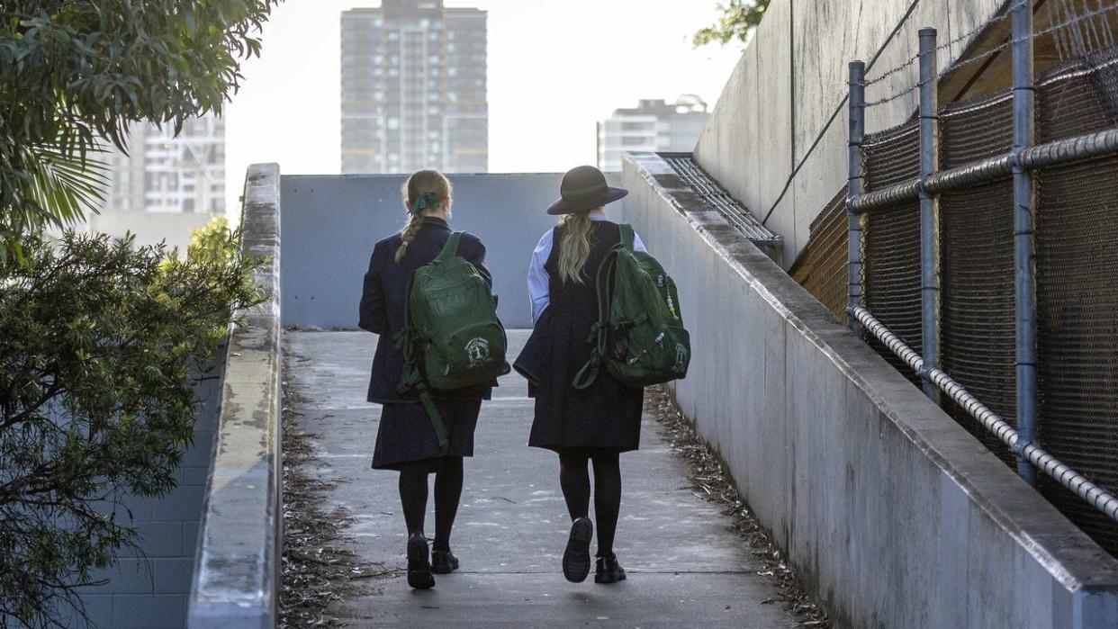 BRISBANE AUSTRALIA - NewsWire Photos AUGUST 12, 2021: Education stock of students from the South Brisbane area leaving school for the day. NCA NewsWire / Sarah Marshall