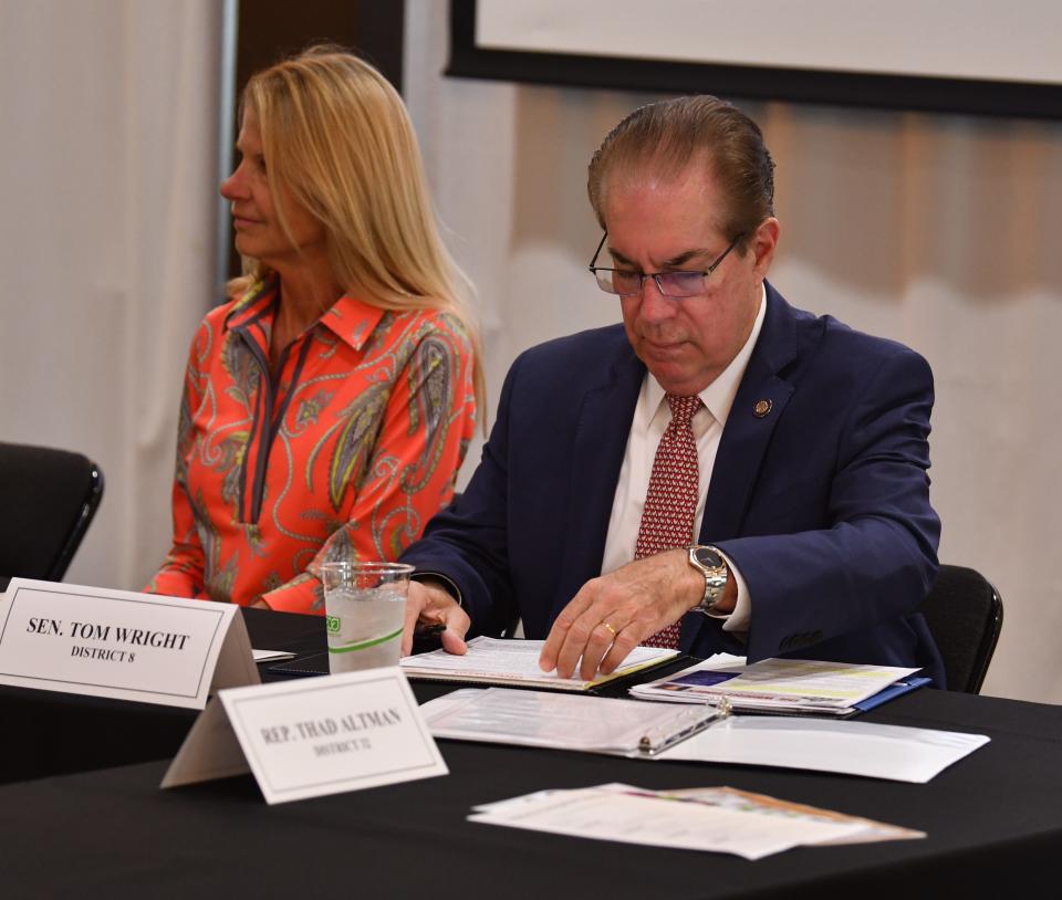 Sens. Debbie Mayfield and Tom Wright listen to Brevard's school board members at Friday's legislative delegation luncheon. The meeting was held at Brevard Zoo's Nyami Nyami River Lodge.