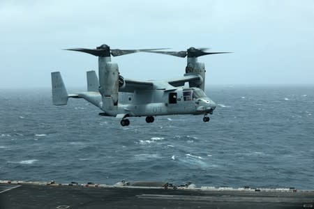 An MV-22 Osprey aircraft lands on the deck of USS Abraham Lincoln the Gulf of Oman near the Strait of Hormuz