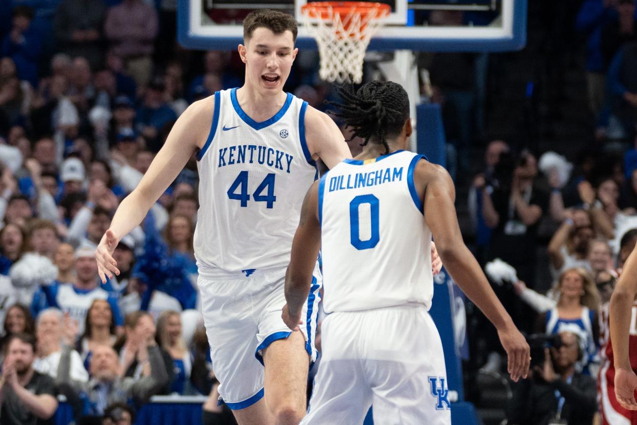 Kentucky forward Zvonimir Ivisic (44) celebrates a play with guard Rob Dillingham (0) during the team's game against Arkansas at Rupp Arena on March 2. UK opens NCAA Tournament play Thursday night against Oakland.