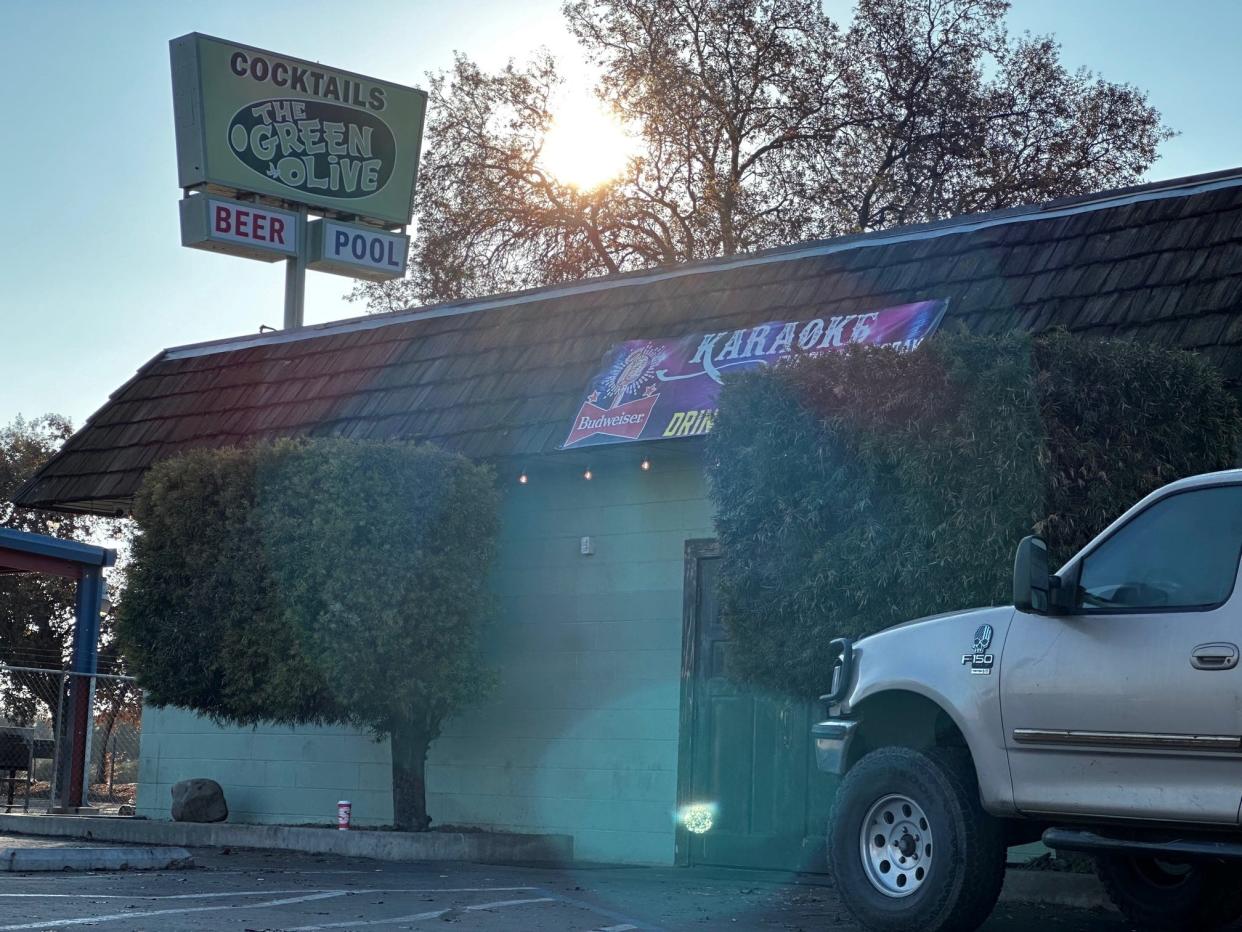 A Visalia bouncer is dead after a fight at The Green Olive bar off Highway 198.