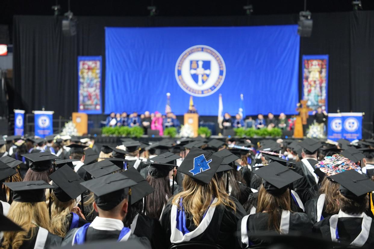 Assumption University, a private, Catholic school, celebrated its 107th commencement Sunday with about 415 graduates earning 485 degrees, 69 graduates earning double majors and one earning a triple major.