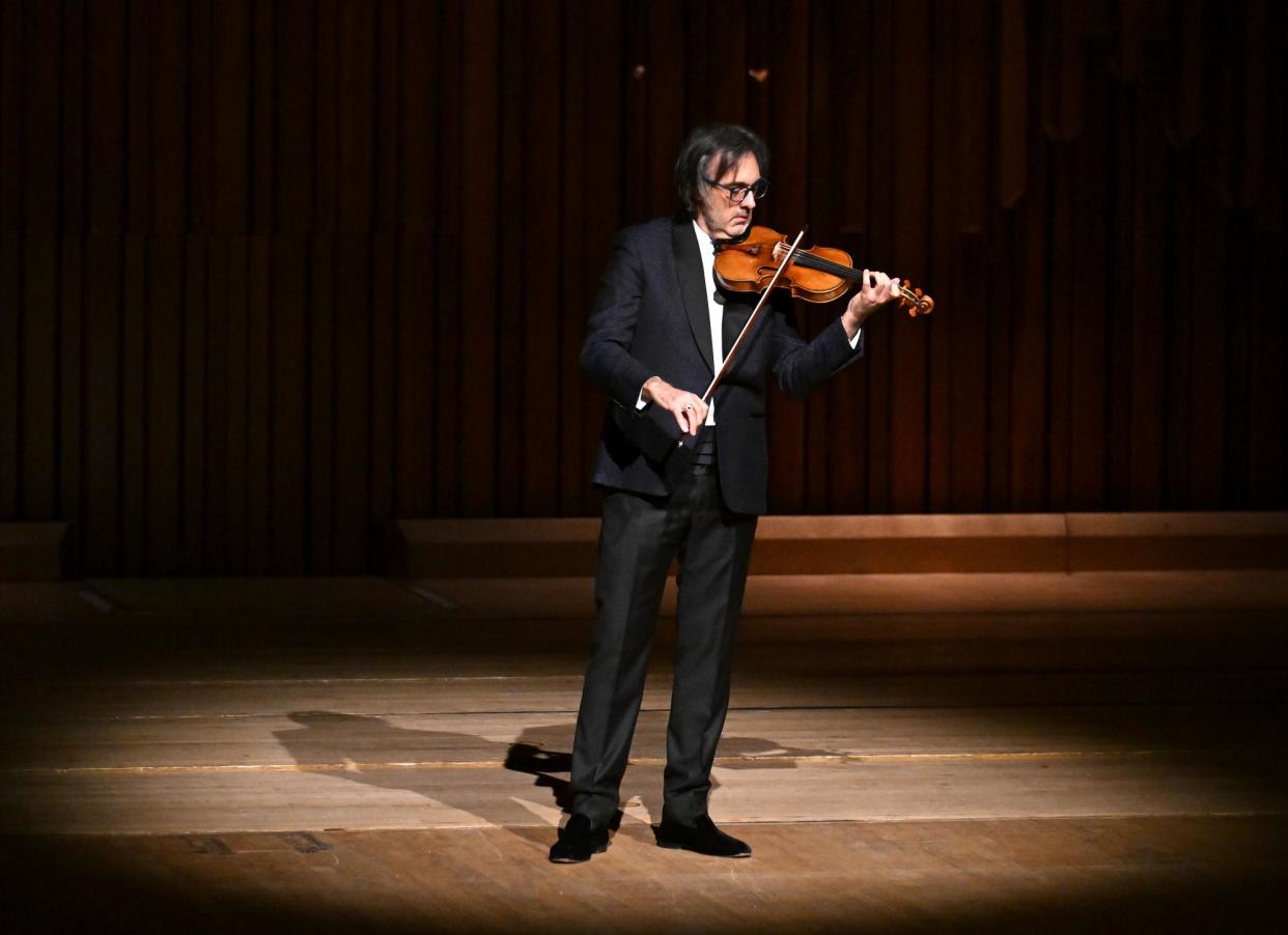 <span>‘Phrases float into the air’ … Leonidas Kavakos at the Barbican, London.</span><span>Photograph: Mark Allan/Barbican</span>