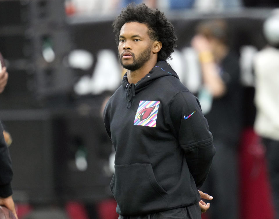 FILE - Arizona Cardinals quarterback Kyler Murray pauses on the field prior to an NFL football game against the Cincinnati Bengals, Oct. 8, 2023, in Glendale, Ariz. The Cardinals are awaiting Murray's return from a knee injury that prematurely ended his 2022. (AP Photo/Ross D. Franklin, File)