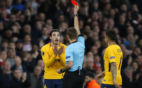 Sime Vrsaljko reacts as he is shown a red card  - Credit: AFP