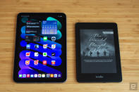 <p>Apple's iPad mini next to Amazon's Kindle Paperwhite.</p> 