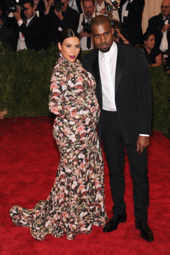 <p>(L-R): Kim Kardashian and Kanye West attend the Costume Institute Gala for the “PUNK: Chaos to Couture” exhibition at the Metropolitan Museum of Art in New York City on May 6, 2013.</p>