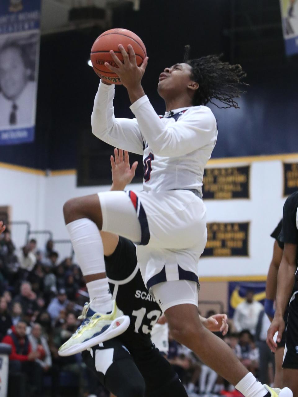 Stepinac's Danny Carbuccia drives to the net during a CHSAA Archdiocesan Tournament semifinal with Monsignor Scanlan at Mount Saint Michael Academy in the Bronx Feb. 20, 2024. Stepinac won 85-63.