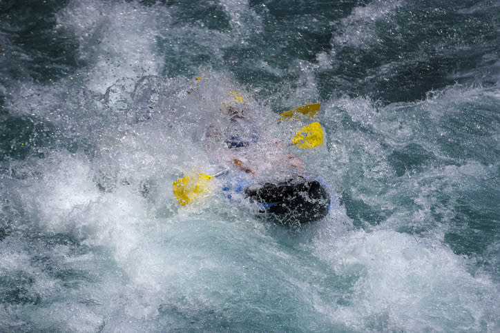 Person navigating through rapid whitewater in an inflatable yellow raft. The text in the article categorizes this as an Internet Find