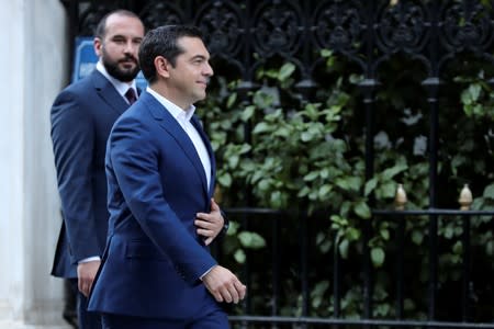 Greek PM Tsipras arrives at the Presidential Palace for a meeting with Greek President Pavlopoulos to discuss snap elections in Athens