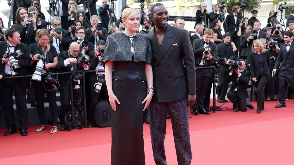 Greta Gerwig in Chanel and Omar Sy in Burberry on May 16. - Vittorio Zunino Celotto/Getty Images