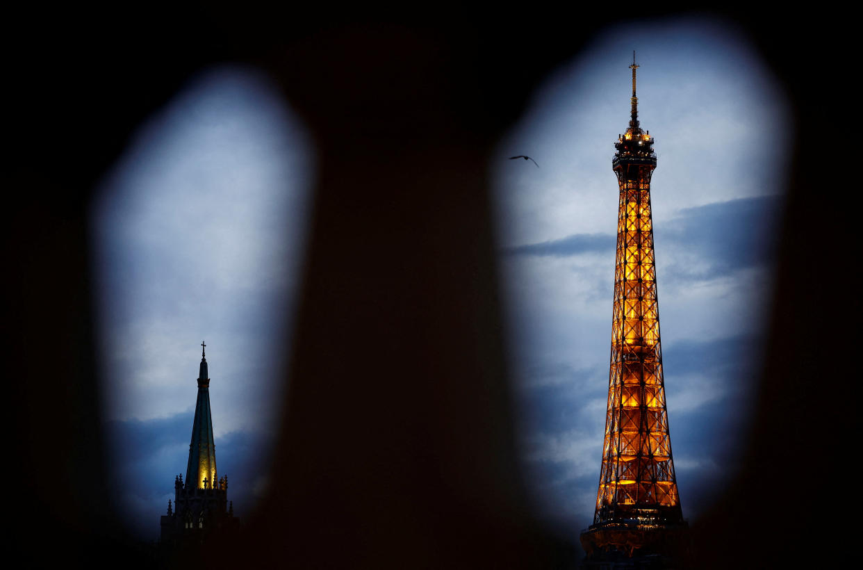 The Eiffel Tower is seen at sunset in Paris, France, October 15, 2022. REUTERS/Stephane Mahe