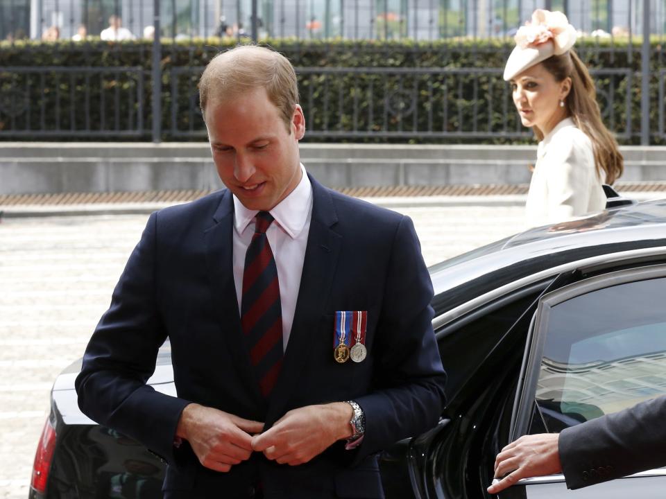 Britain's Prince William and his wife Catherine, Duchess of Cambridge, arrive for lunch at the Provincial palace after a ceremony at the Cointe Inter-allied Memorial, commemorating the 100th anniversary of the outbreak of World War I (WWI) in Liege August 4, 2014. (REUTERS/Pascal Rossignol)