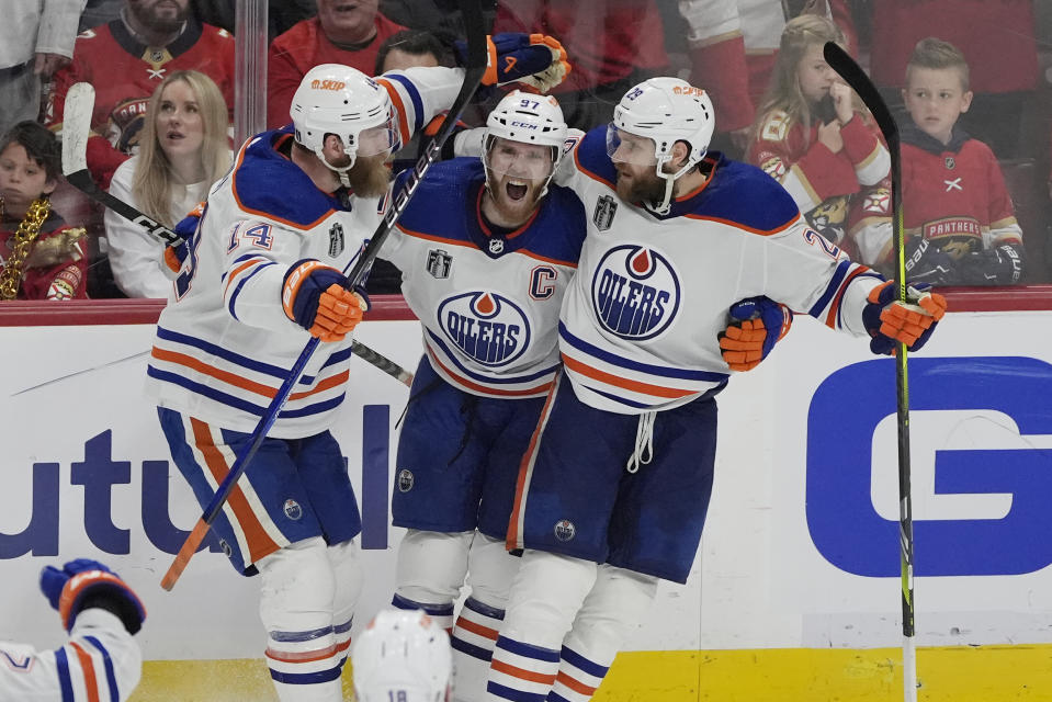 Edmonton Oilers center Connor McDavid (97) celebrates his goal during the third period of Game 5 of the NHL hockey Stanley Cup Finals against the Florida Panthers, Tuesday, June 18, 2024, in Sunrise, Fla. The Oilers defeated the Panthers 5-3. (AP Photo/Rebecca Blackwell)