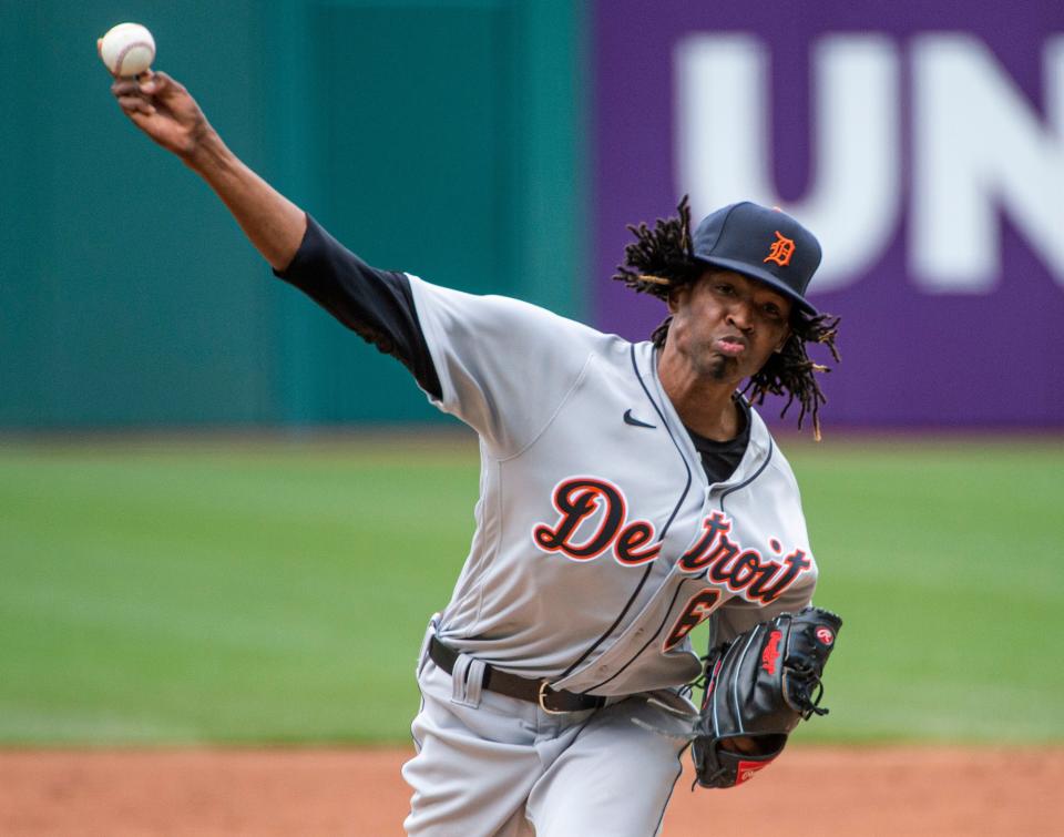 Detroit Tigers starting pitcher Jose Urena delivers against the Cleveland Indians during the first inning of a baseball game in Cleveland, Sunday, April 11, 2021.