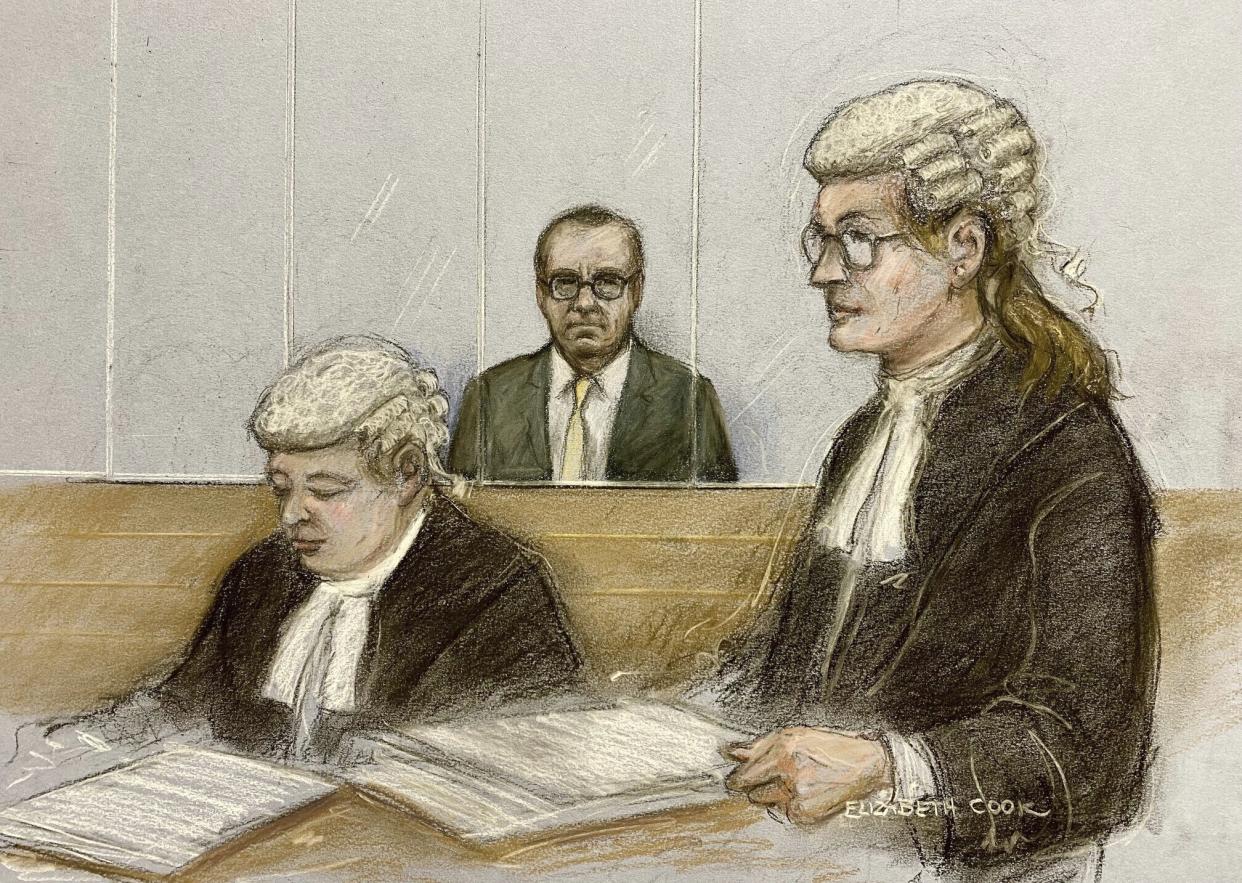 Court artist sketch by Elizabeth Cook of actor Kevin Spacey, center, in the dock as he listens to Christine Agnew KC, right, at Southwark Crown Court, London, Friday, June 30, 2023. Spacey is going on trial on charges he sexually assaulted four men as long as two decades ago. The double-Oscar winner faces a dozen charges at Southwark Crown Court. Spacey pleads not guilty to all charges. (Elizabeth Cook/PA via AP)