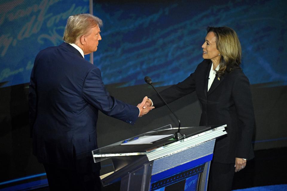 Vice President Kamala Harris and former President Donald Trump greet before their first presidential debate in Philadelphia on Sept. 10, 2024.