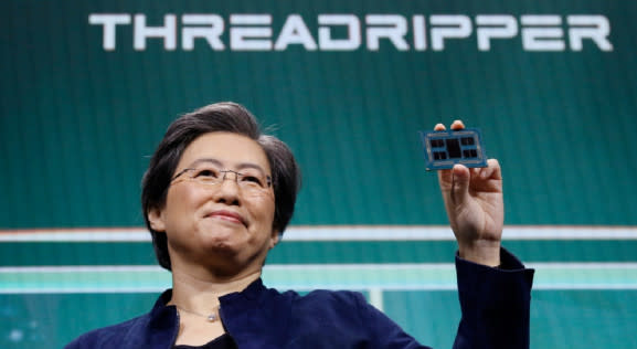 AMD's Lisa Su shows off the latest 64-core Threadripper processor.