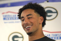 Green Bay Packers quarterback Jordan Love smiles as he listens to a question during a news conference after an NFL football game against the Chicago Bears Sunday, Sept. 10, 2023, in Chicago. The Packers won 38-20. (AP Photo/Nam Y. Huh)