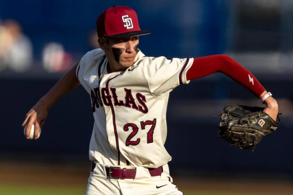 Marjory Stoneman Douglas pitcher Jayden Dubanewicz (27) throws the ball during the second inning of a high school baseball game against Columbus at Columbus High School in Miami, Florida, on Friday, March 24, 2023.