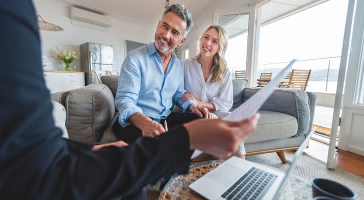 A couple happy to see their tax bill on $1 million