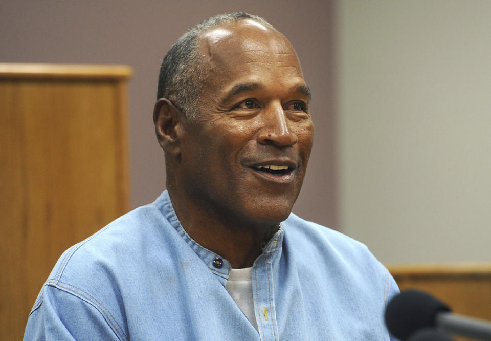 FILE – Former NFL football star O.J. Simpson appears via video for his parole hearing at the Lovelock Correctional Center in Lovelock, Nev., on July 20, 2017. Simpson, the decorated football superstar and Hollywood actor who was acquitted of charges he killed his former wife and her friend but later found liable in a separate civil trial, has died. He was 76. (Jason Bean/The Reno Gazette-Journal via AP, Pool, File)