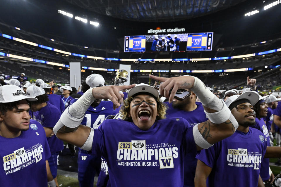 Washington cornerback Kamren Fabiculanan celebrates the team's win over Oregon in the Pac-12 championship NCAA college football game Friday, Dec. 1, 2023, in Las Vegas. (AP Photo/David Becker)