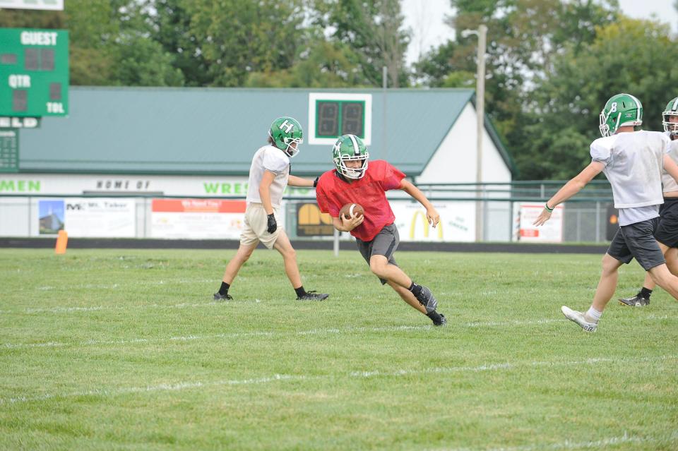 The Huntington Huntsmen undergo practice ahead of their 50th football season.