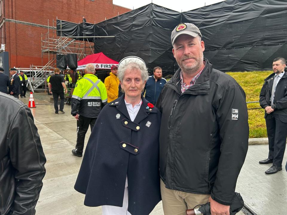 Patricia Hearn (left) walked in the ceremony's parade representing nurses. Her son, Chris Hearn (right) attended to show his support.  