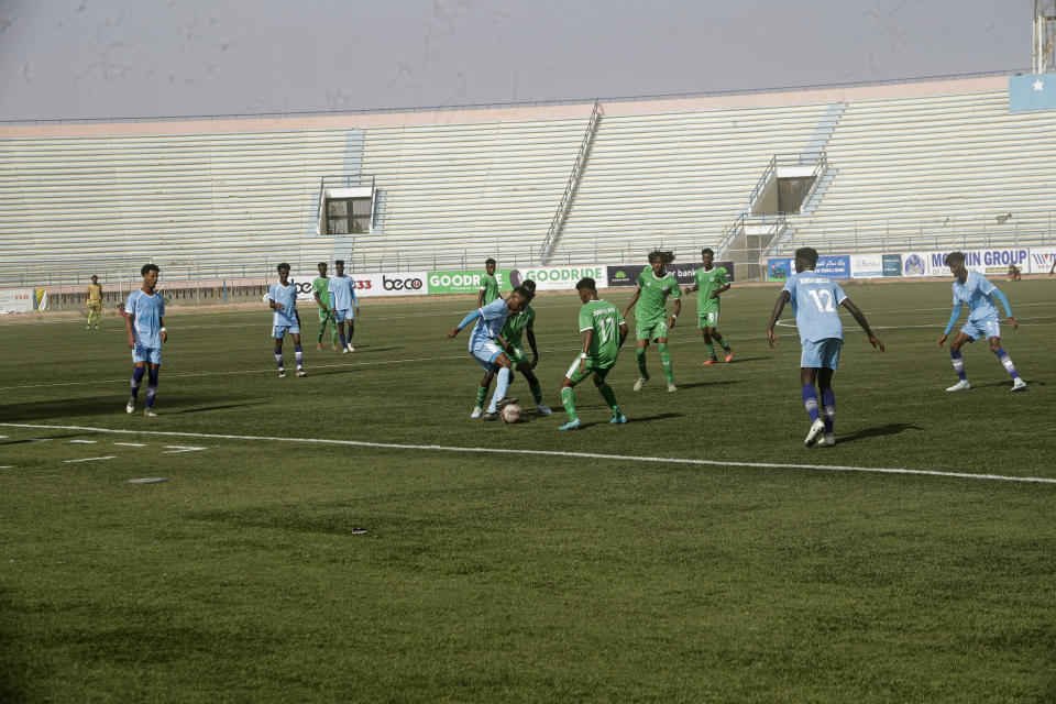 Hirshabele and Jubaland play a soccer league match at a stadium in Mogadishu, Somalia, Tuesday, Jan 23, 2024. A stadium in the violence-prone Somali capital is hosting its first soccer tournament in three decades, drawing thousands of people to a sports facility that had fallen into disuse and later became a military base amid civil war. (AP Photo/Farah Abdi Warsameh)