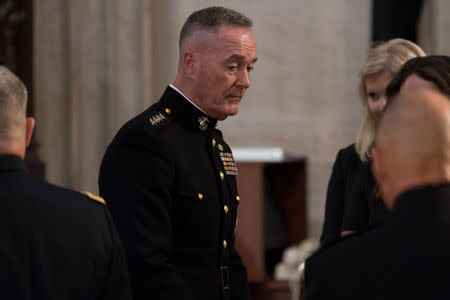 Joint Chiefs Chairman Gen. Joseph Dunford arrives in the Rotunda before the casket of U.S. Senator John McCain lies in state at the U.S. Capitol in Washington, U.S., August 31, 2018. Andrew Harnik/Pool via REUTERS/Files