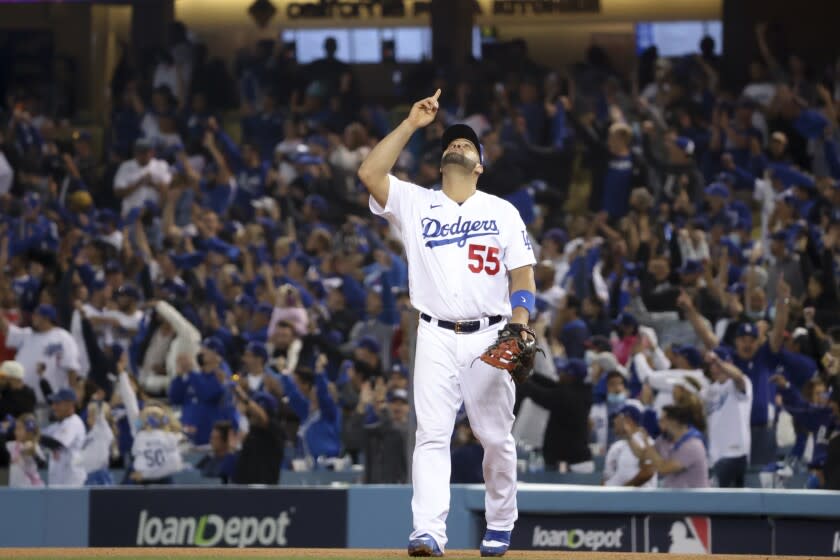 Los Angeles, CA - October 21: Los Angeles Dodgers' Albert Pujols celebrates after defeating the Atlanta Braves 11-2 in game five in the 2021 National League Championship Series at Dodger Stadium on Thursday, Oct. 21, 2021 in Los Angeles, CA. (Robert Gauthier / Los Angeles Times)