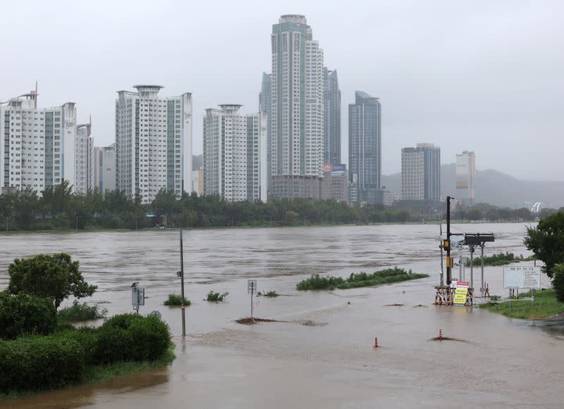 Rains lash southern Japan as Khanun takes aim at South Korea