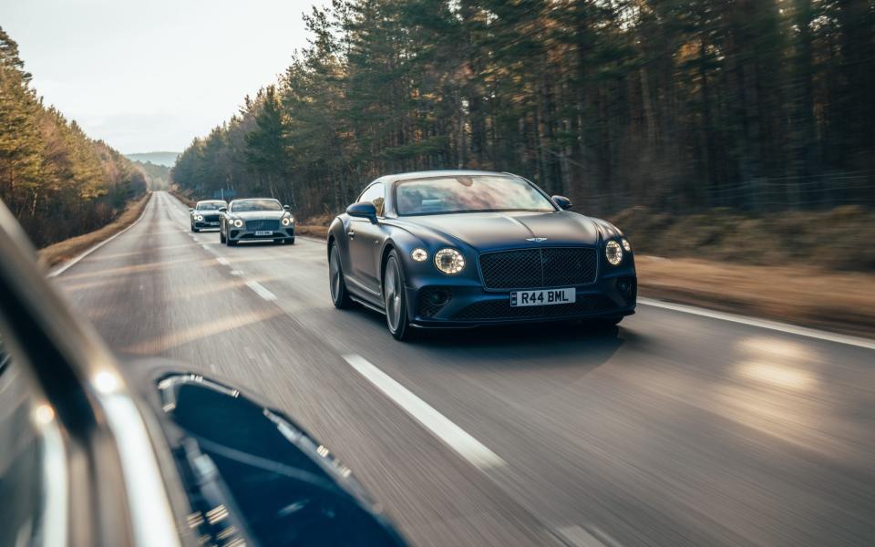 Series of Bentley cars on the highway