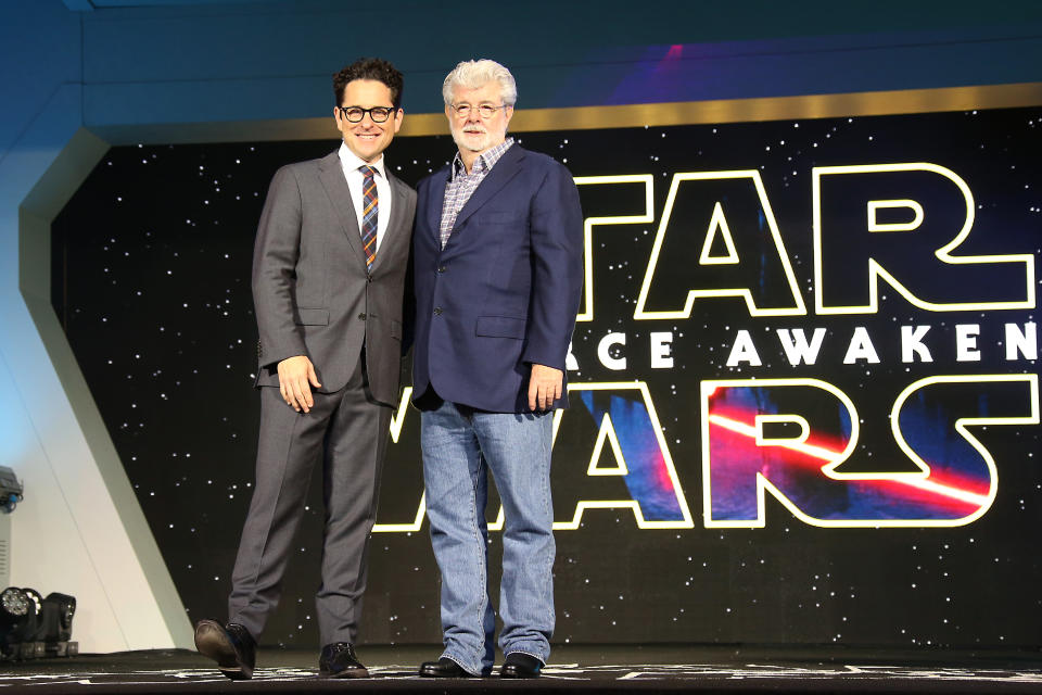 J.J. Abrams, left, and George Lucas pose for photographers upon arrival at the European premiere of the film 'Star Wars: The Force Awakens ' in London, Wednesday, Dec. 16, 2015. (Photo by Joel Ryan/Invision/AP)