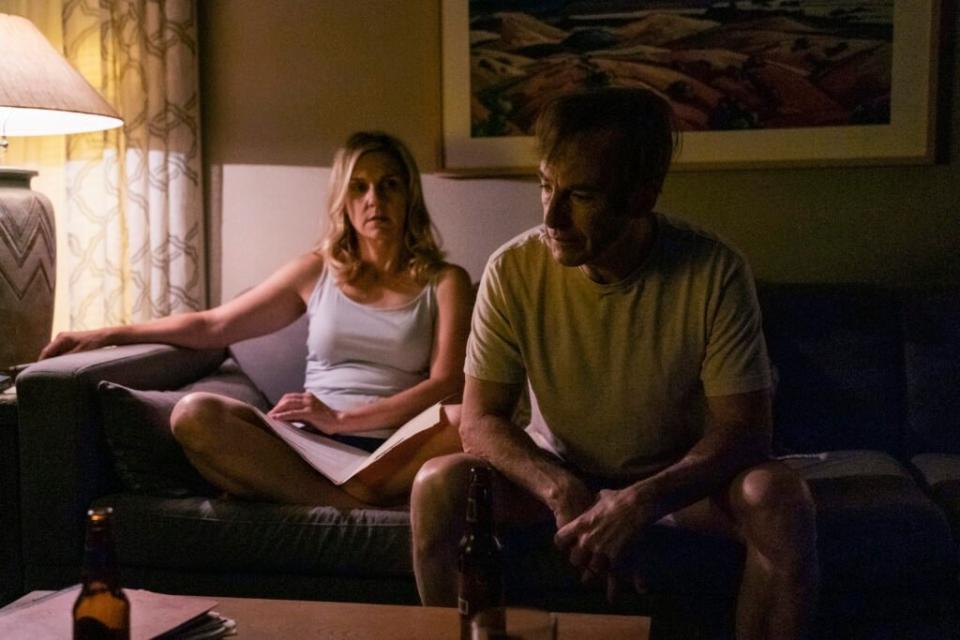 Rhea Seehorn. Kim Wexler sitting with Jimmy McGill on a couch in Better Call Saul