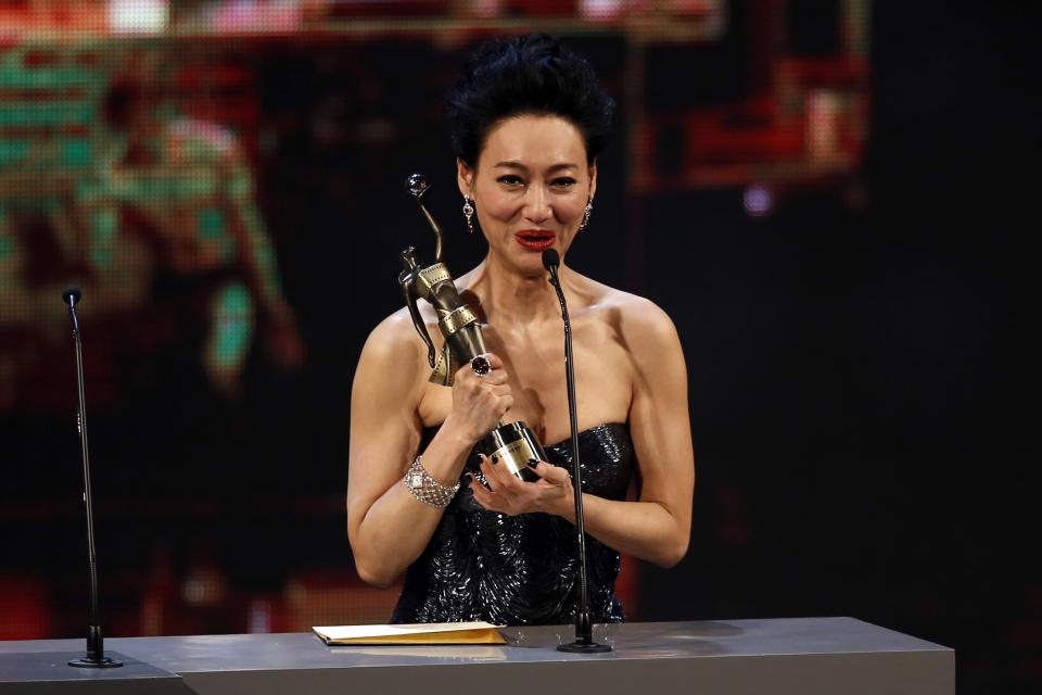 Hong Kong actress Kara Wai Ying Hung celebrates after winning Best Supporting Actress at the Hong Kong Film Awards