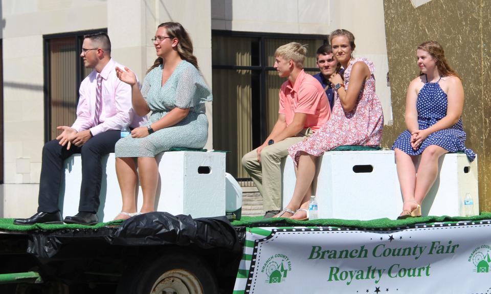 Branch County Fair court candidates ride in the parade Saturday.