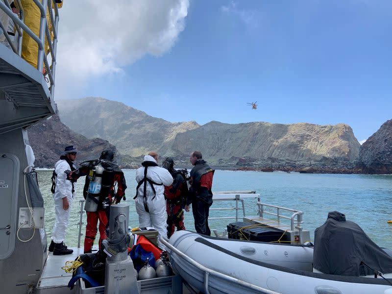 Members of a dive squad conduct a search during a recovery operation around White Island, which is also known by its Maori name of Whakaari, a volcanic island that fatally erupted earlier this week, in New Zealand