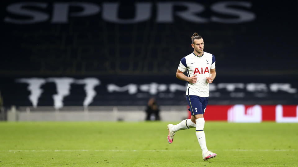 Tottenham's Gareth Bale enters pitch during the English Premier League soccer match between Tottenham Hotspur and West Ham United at the Tottenham Hotspur Stadium in London, England, Sunday, Oct. 18, 2020. (Clive Rose/Pool via AP)