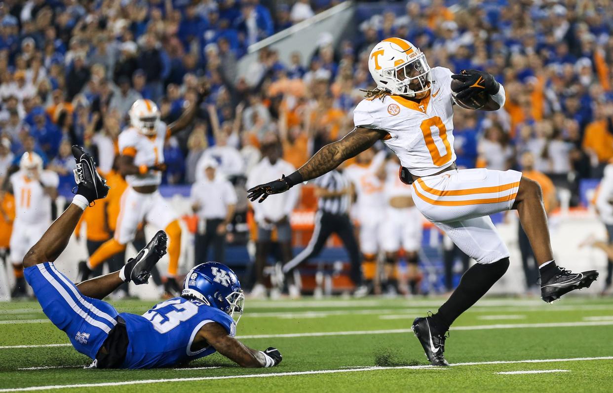 Tennessee running back Jaylen Wright eludes Kentucky's Andre Phillips en route to a touchdown in October.