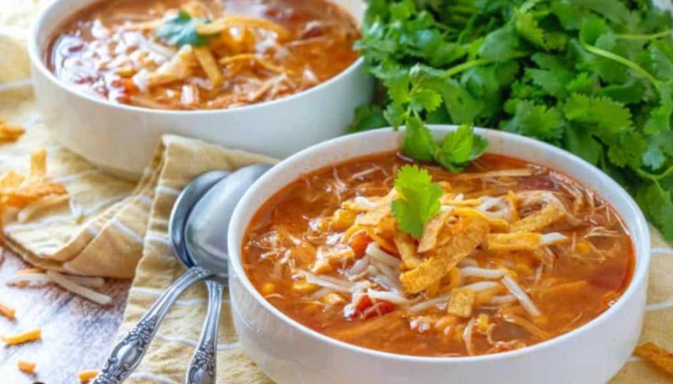 <p>The Country Cook</p><p>A warm soup made with shredded chicken, chicken broth, taco seasoning, enchilada sauce and Rotel.</p><p><strong>Get the recipe: <a href="https://www.thecountrycook.net/crock-pot-chicken-tortilla-soup/" rel="nofollow noopener" target="_blank" data-ylk="slk:Crock Pot Chicken Tortilla Soup;elm:context_link;itc:0;sec:content-canvas" class="link ">Crock Pot Chicken Tortilla Soup</a></strong></p>