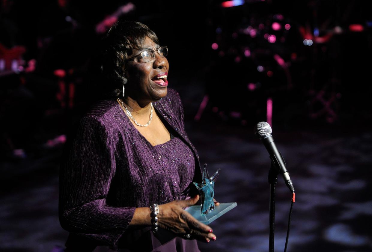 Lela Thompson, a founding member of The Willis Richardson Players, accepts the Enduring Contribution to Wilmington Theater Award named for her in 2012 at Thalian Hall.