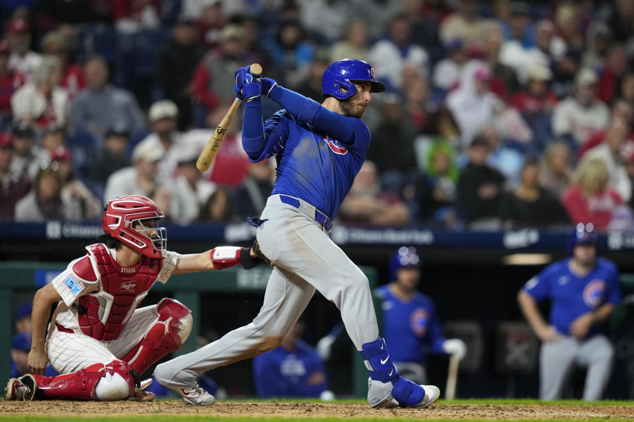 Chicago Cubs' Cody Bellinger follows through after hitting a single against Philadelphia Phillies pitcher Tyler Gilbert during the eighth inning of a baseball game, Tuesday, Sept. 24, 2024, in Philadelphia. (AP Photo/Matt Slocum)