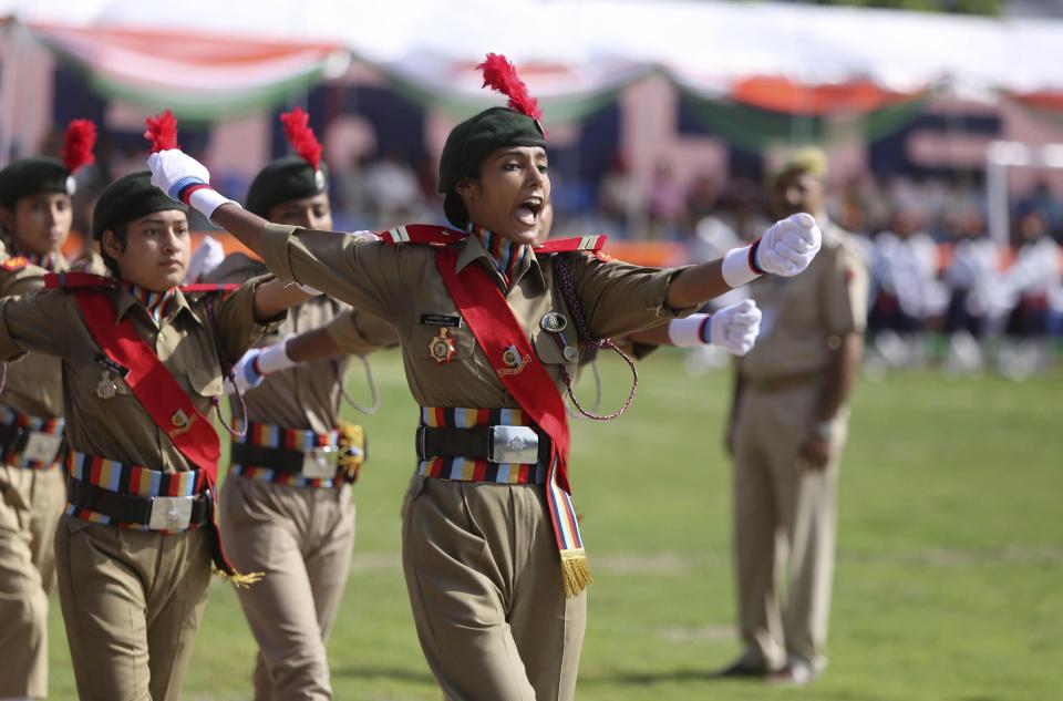Members of the National Cadet Corps (NCC) march during India's Independence Day celebrations, in Jammu, India, Thursday, Aug.15, 2019. Indian Prime Minister Narendra Modi defended his government's controversial measure to strip the disputed Kashmir region of its statehood and special constitutional provisions in an Independence Day speech Thursday, as about 4 million Kashmiris stayed indoors for the 11th day of an unprecedented security lockdown and communications blackout. (AP Photo/Channi Anand)