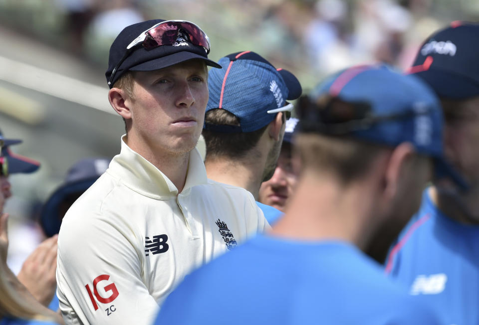 England's Zak Crawley watches the presentation ceremony after their loss in the second cricket test match against New Zealand at Edgbaston in Birmingham, England, Sunday, June 13, 2021. New Zealand won the series 1-0. (AP Photo/Rui Vieira)