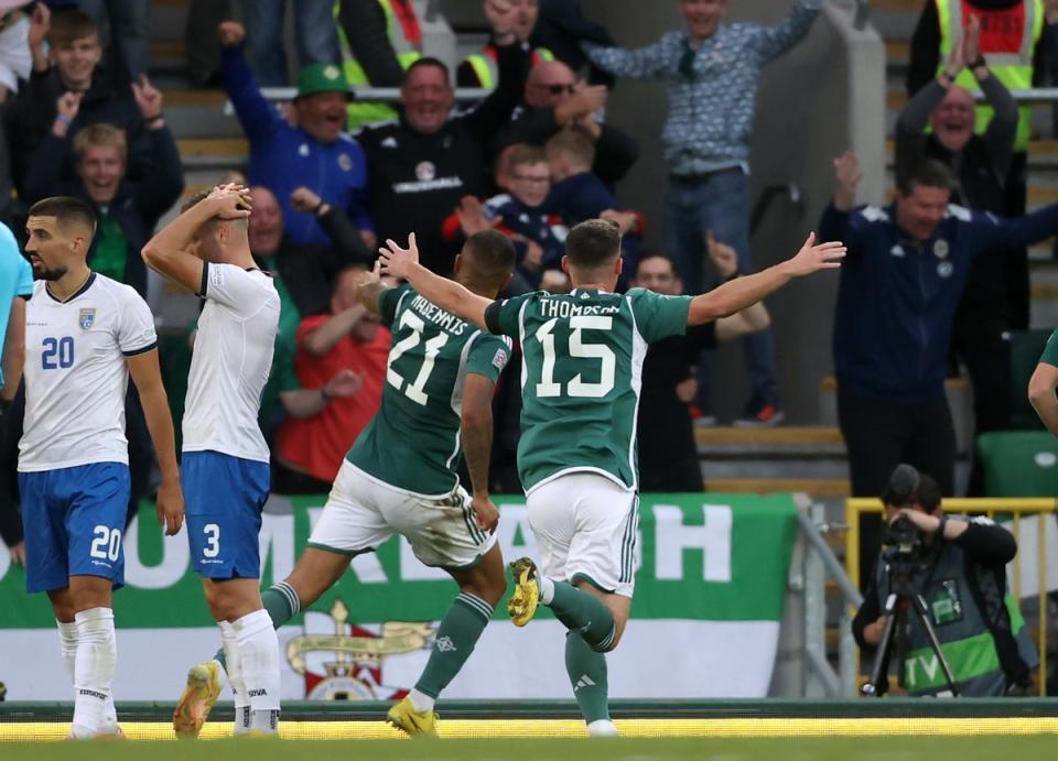 Josh Magennis, centre, celebrates his late winner (Liam McBurney/PA) (PA Wire)