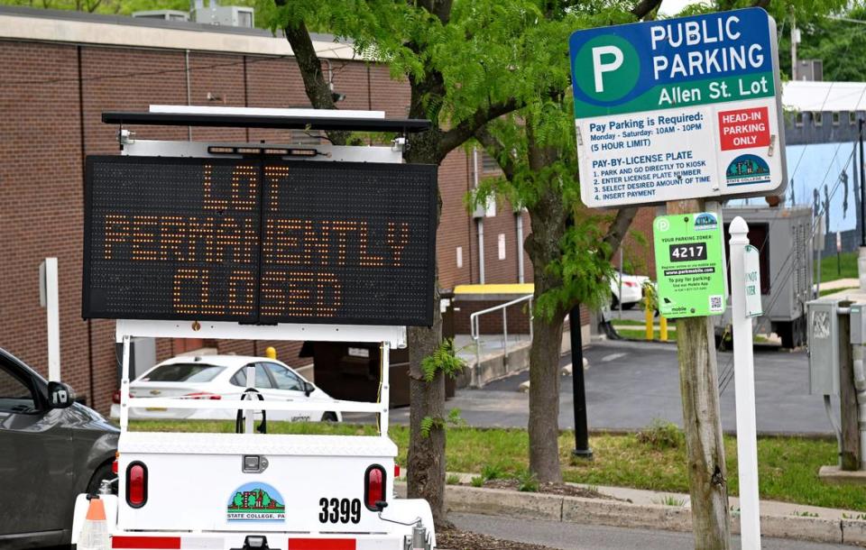 A digital signs tells drivers the Allen Street parking lot will permanently close May 13.