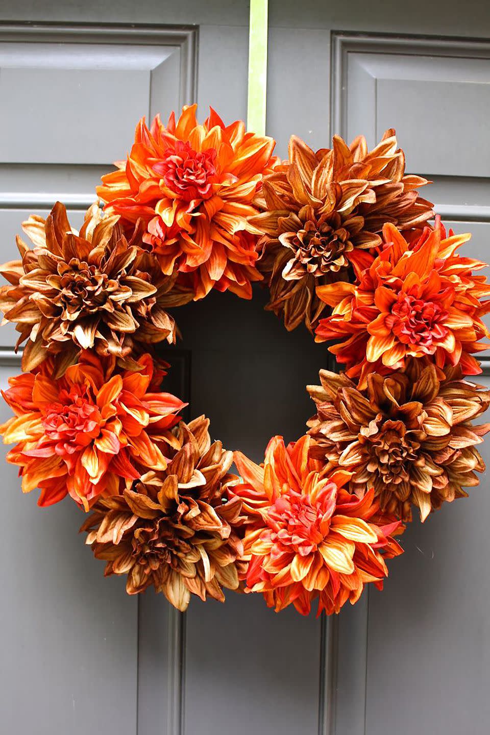 <p>Fresh flower wreaths might be beautiful, but sometimes they just aren't practical. Add a touch of fall to your home with this easy-to-make <a href="https://www.amazon.com/Nearly-Natural-Dahlia-Vase-Arrangement/dp/B015HHW1YI/?tag=syn-yahoo-20&ascsubtag=%5Bartid%7C10070.g.2544%5Bsrc%7Cyahoo-us" rel="nofollow noopener" target="_blank" data-ylk="slk:faux flower;elm:context_link;itc:0;sec:content-canvas" class="link ">faux flower</a> design. </p><p><strong>Get the tutorial at <a href="https://2beesinapod.com/2015/09/08/easy-fall-wreath/" rel="nofollow noopener" target="_blank" data-ylk="slk:2 Bees in a Pod;elm:context_link;itc:0;sec:content-canvas" class="link ">2 Bees in a Pod</a>. </strong></p>